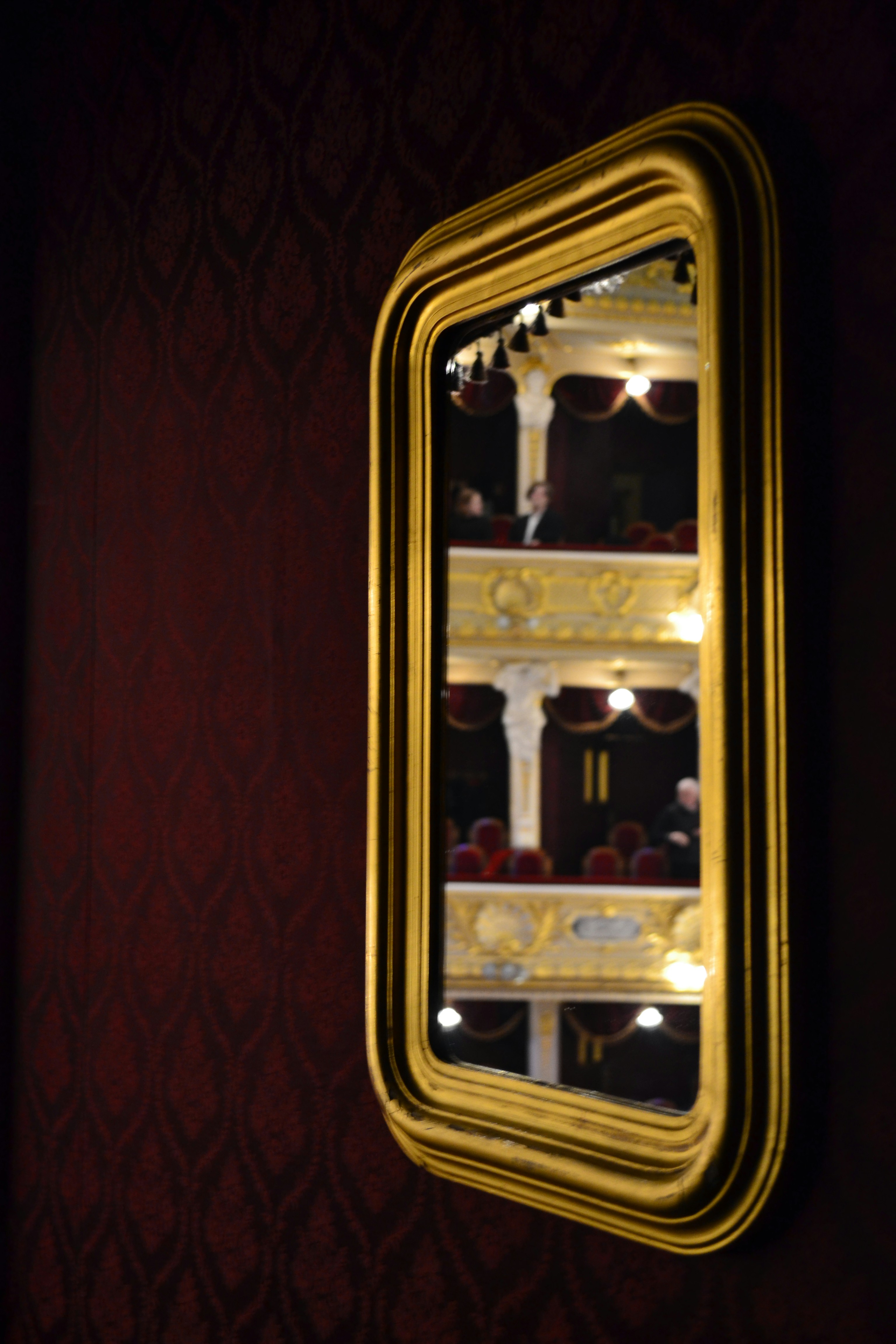 Art and mirror hanging in a San Antonio luxury home